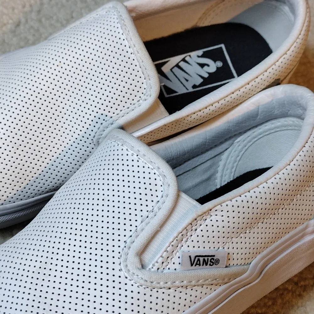 Vans men's white perforated leather slip on loafers. Size 5.5